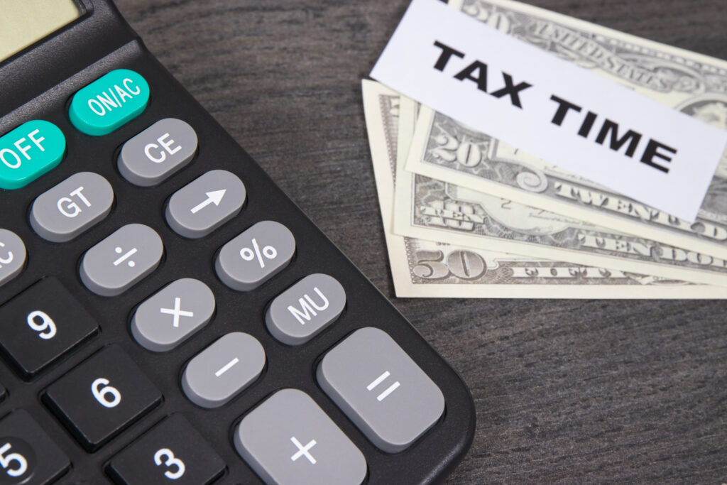 Calculator with 'Tax Time' used in Trust Trevor's Florida homeowner tax tips blog 2025